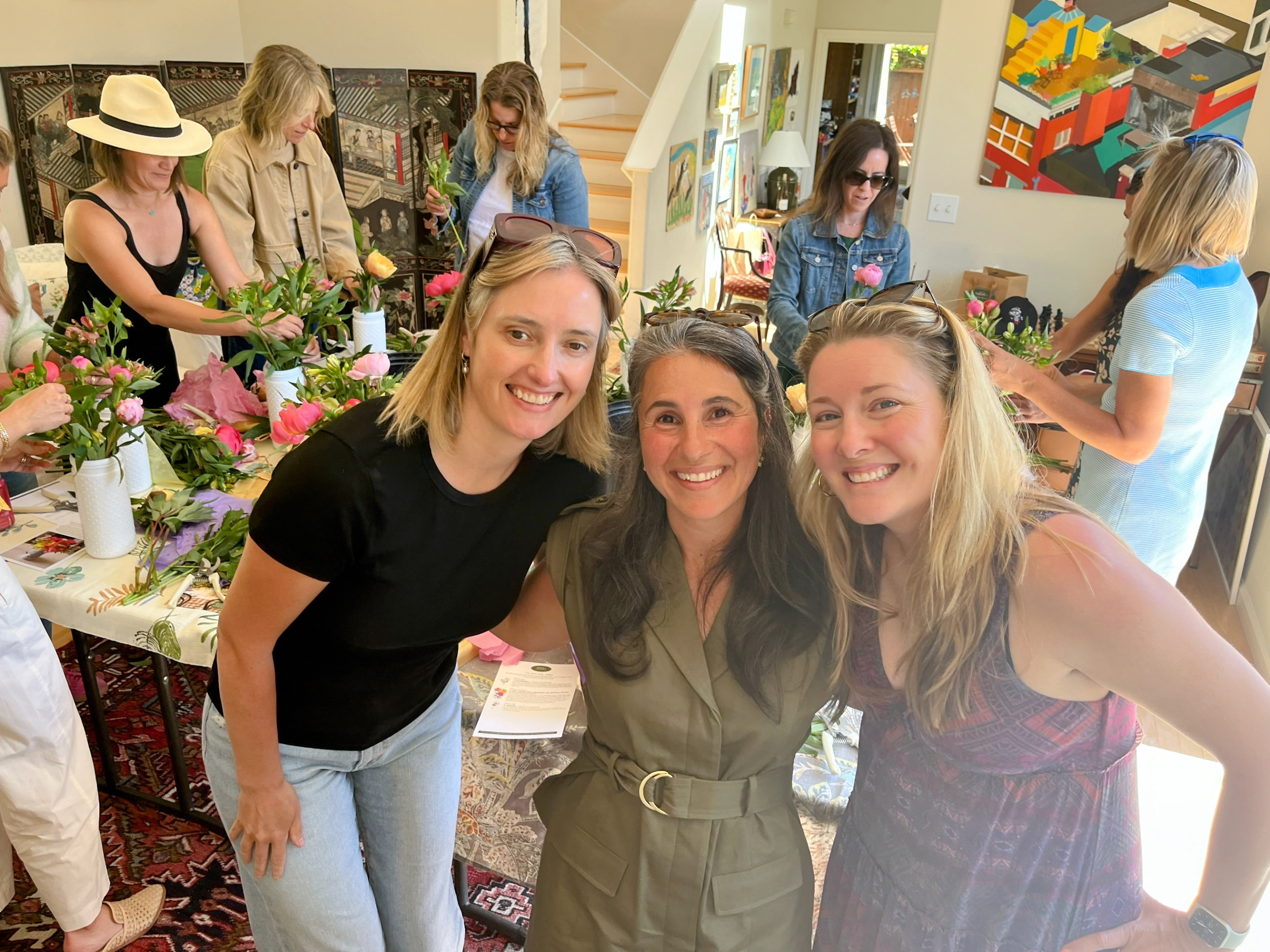 Cris with friends at a flower arranging event